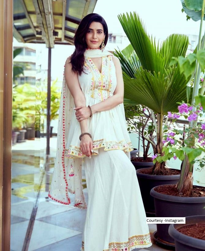Opting for white is always a safe bet, and donning separates like Karishma Tanna is sure to elicit compliments like, 'Darling, you look perfect.'